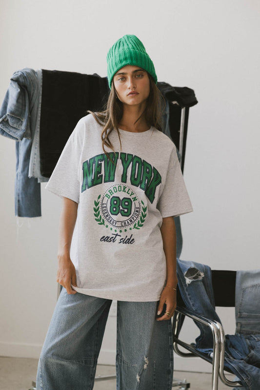 graphic tee with new york text in green