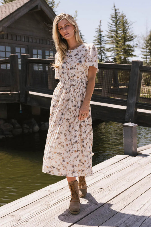 Round neck dress in cream 