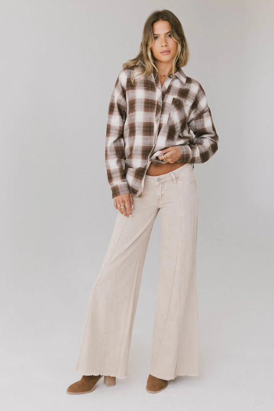 Flared denim pants in cream 