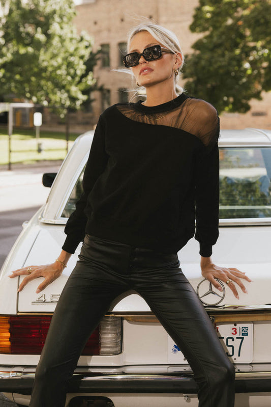 black crewneck sweater with tulle