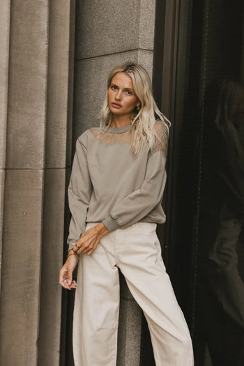 collared detail on sweater
