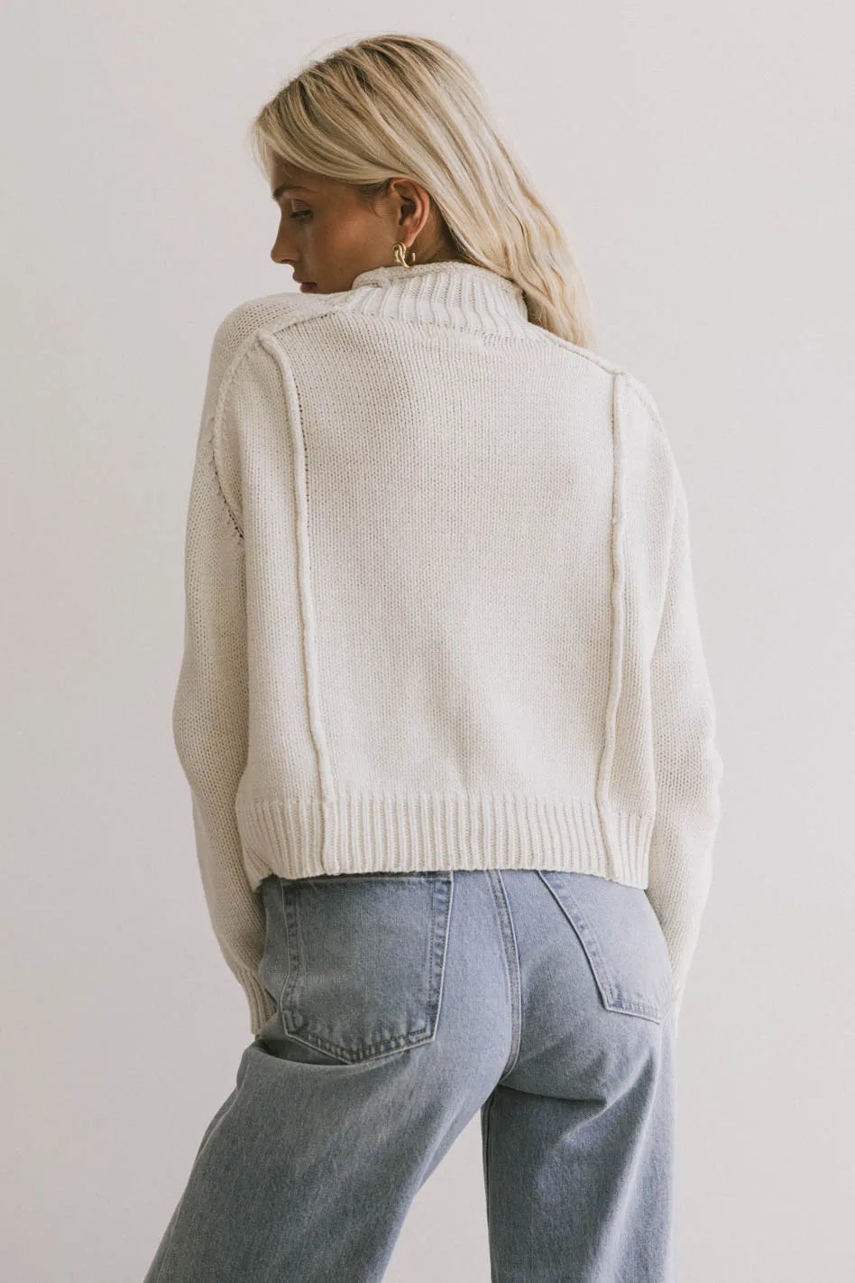 Ribbed hem sweater in cream 