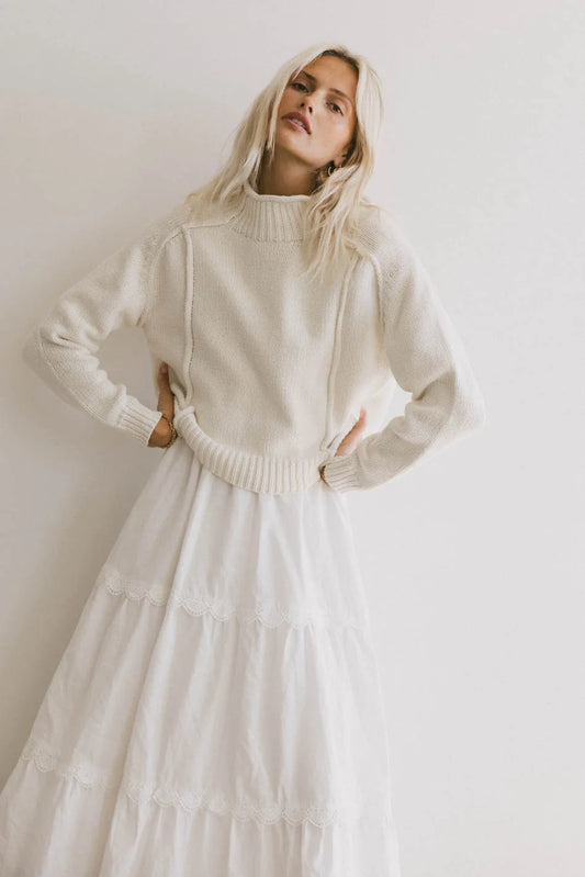 Round neck sweater in cream 