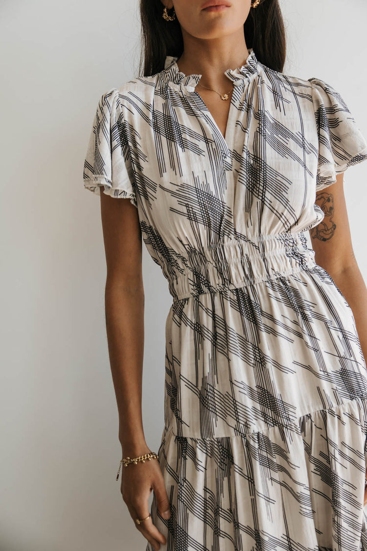 v neck midi dress with abstract print