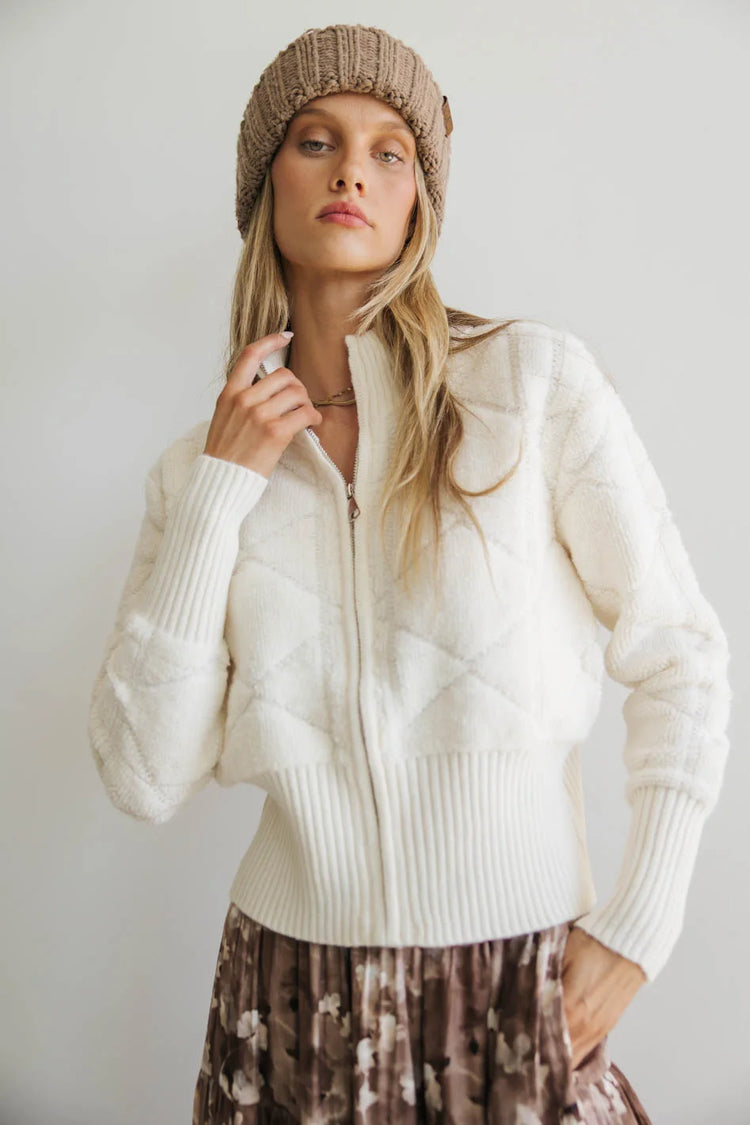 Mock neck style sweater in cream 