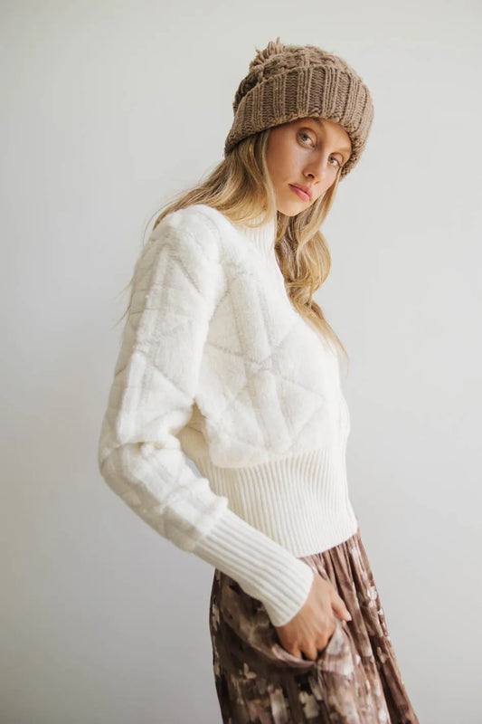 Textured sweater in cream 