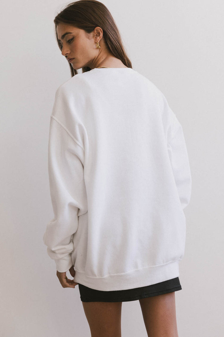 white pullover sweater