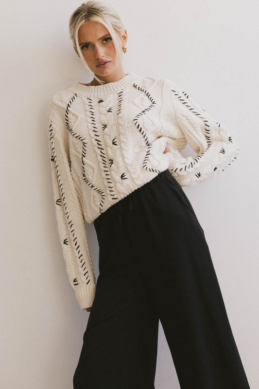 white textured sweater