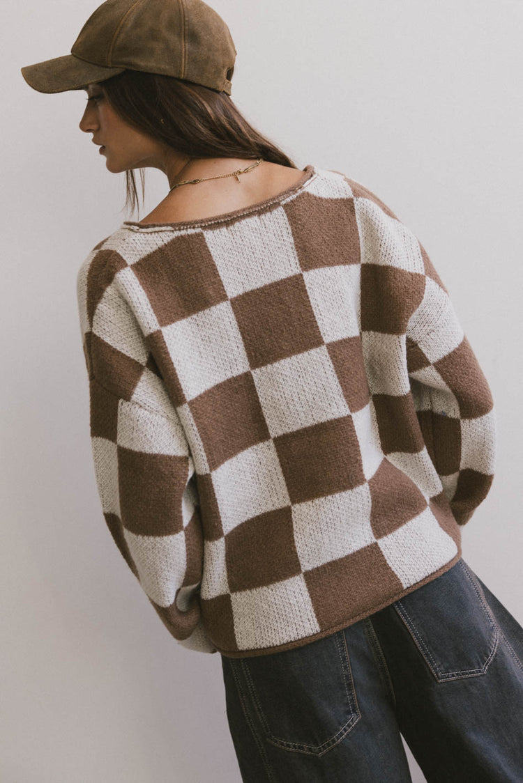 brown and white checker sweater