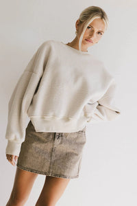 Round neck sweater in cream 