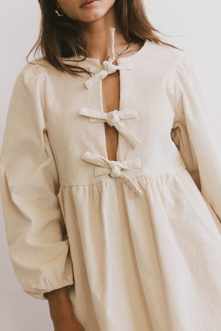 FRONT BOW DRESS IN CREAM