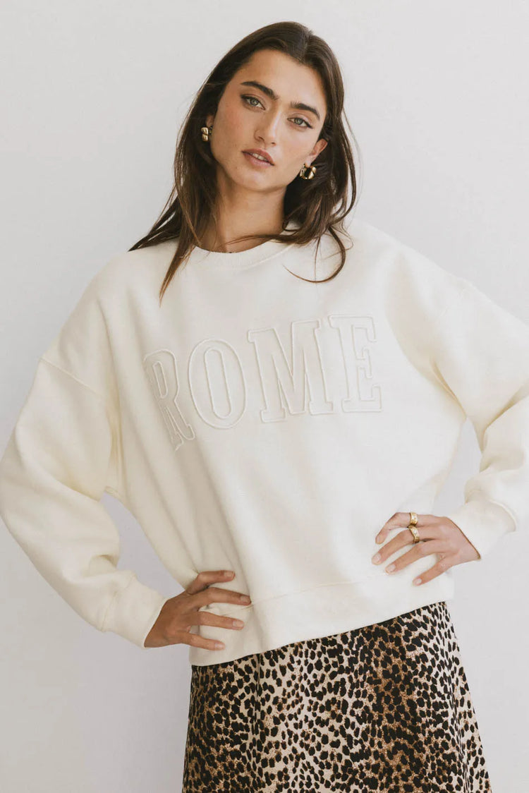 Round neck sweater in cream 