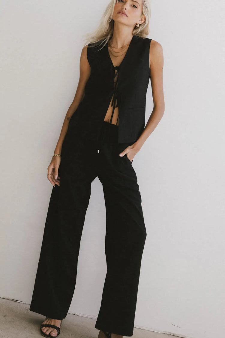 Top paired with a wide leg pants 