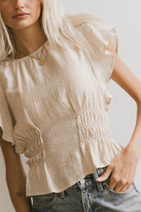 Elastic waist blouse in cream 