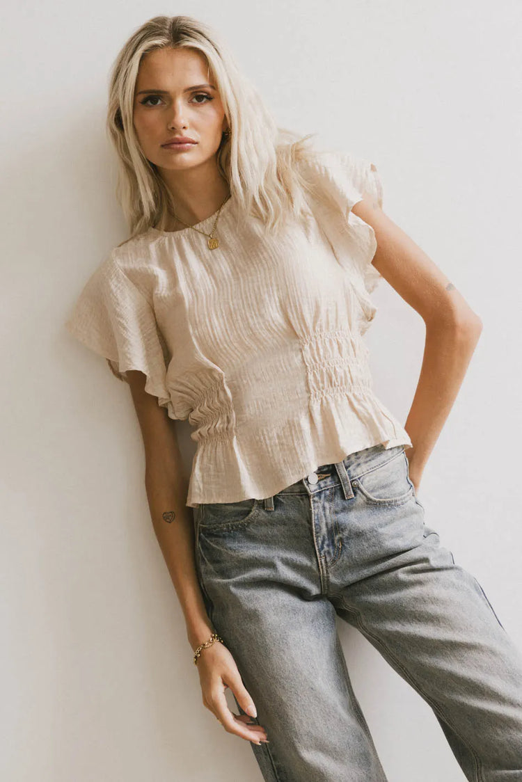 Round neck blouse in cream 