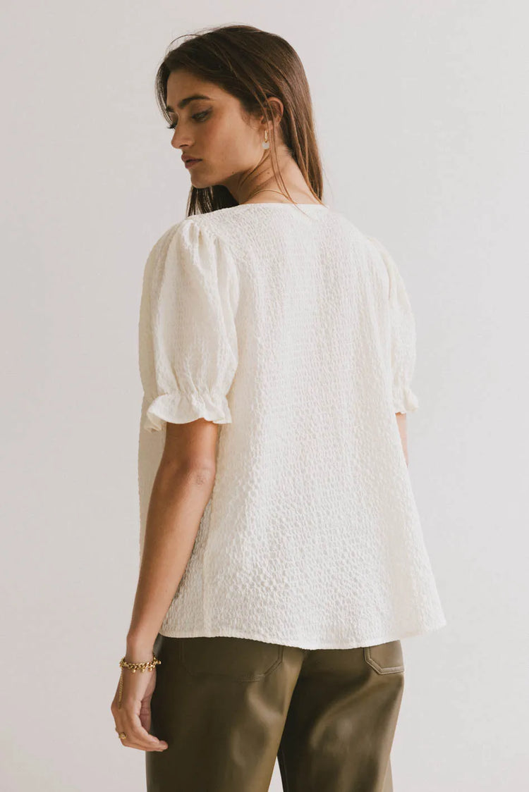 Ruffle cuff sleeves top in ivory 