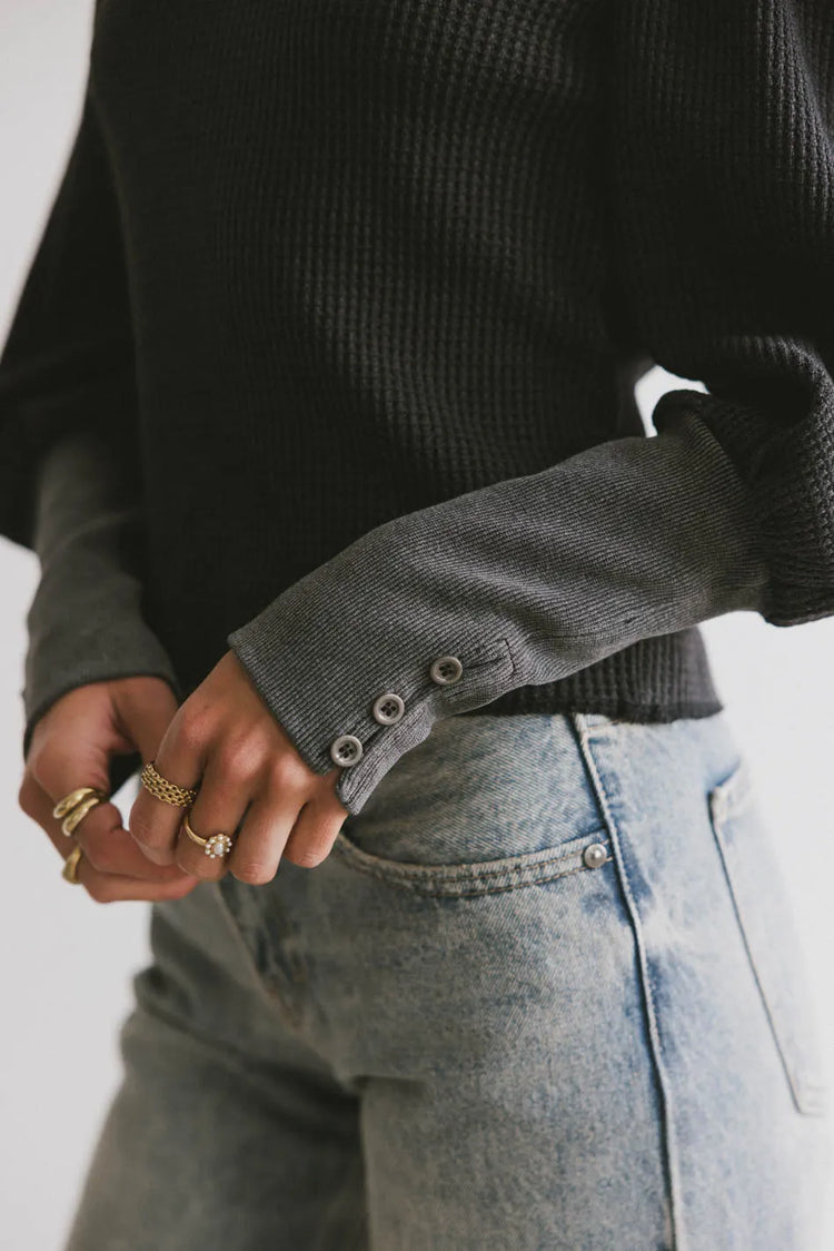 Buttons cuff sleeves top in black 