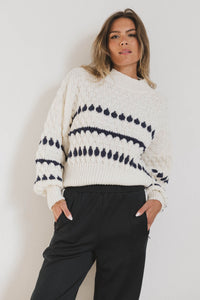 knit sweater in ivory and navy