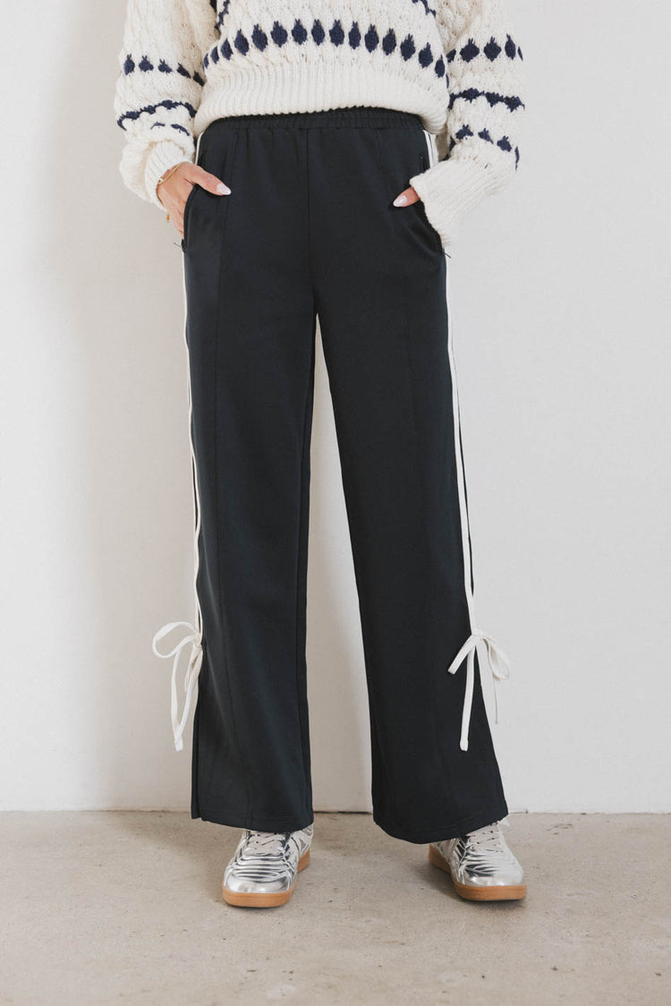 track pants in navy