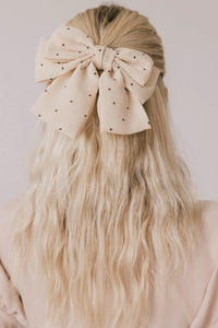 Polka dot bow in cream 