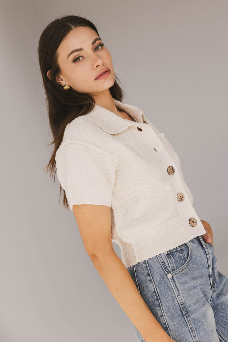 button front short sleeve cardigan in cream