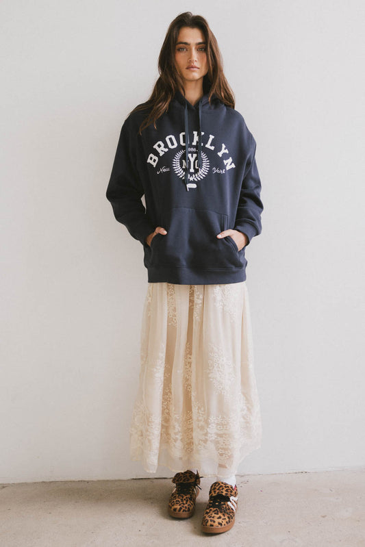 embroidered skirt with navy hoodie