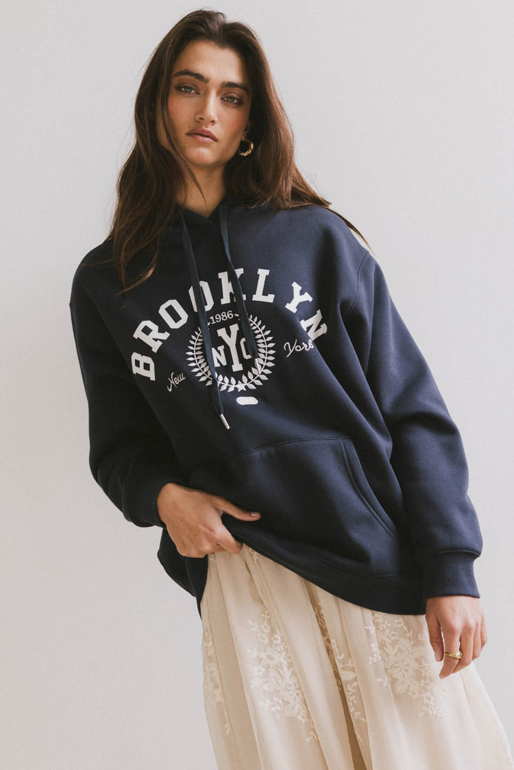 drawstring hoodie in navy with brooklyn nyc text