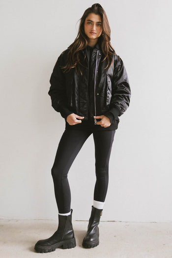 black puff jacket with zipper closure