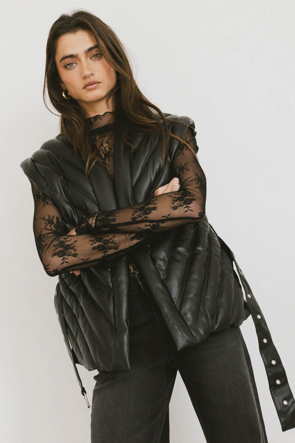 puffer vest in black with belt