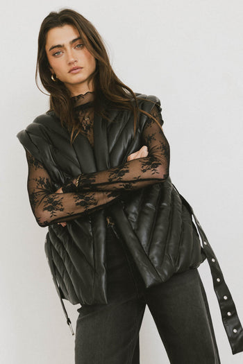 puffer vest in black with belt