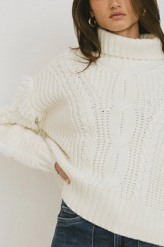 Cable knit sweater in cream 