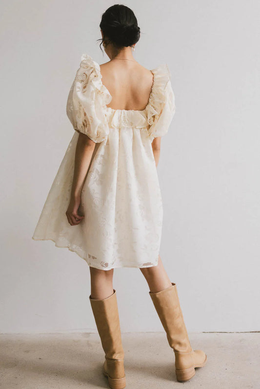 Ruffle shoulder dress in ivory 