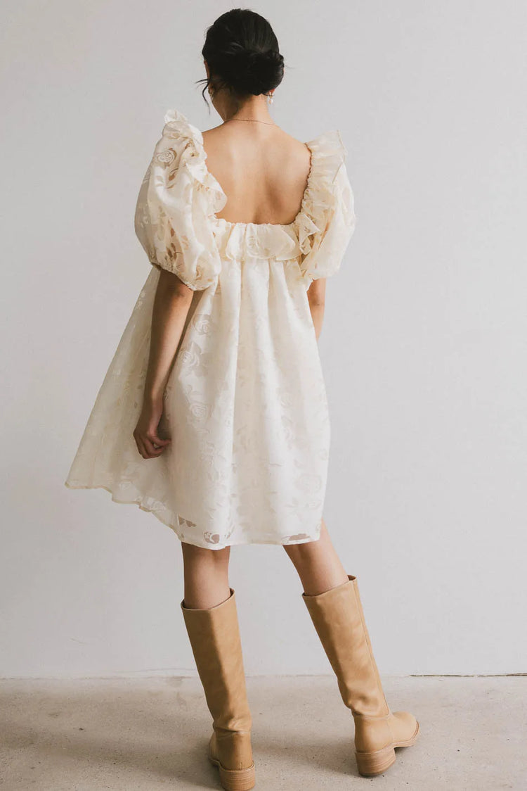 Ruffle shoulder dress in ivory 