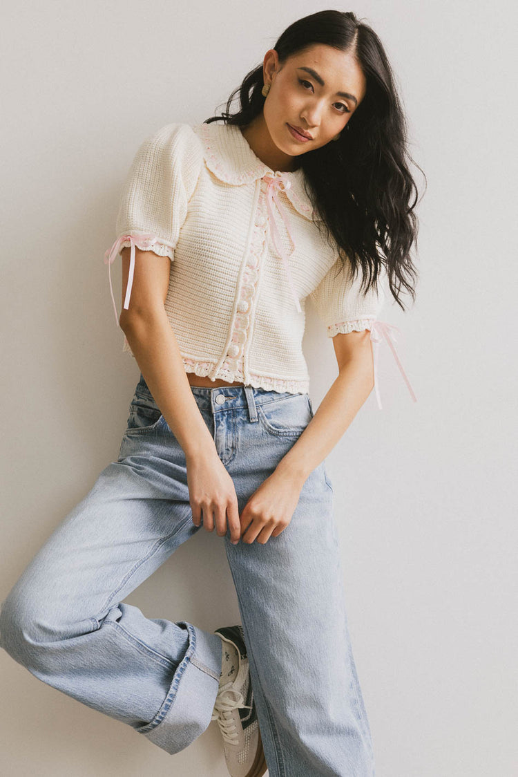 pink tied crochet detail knit button up top