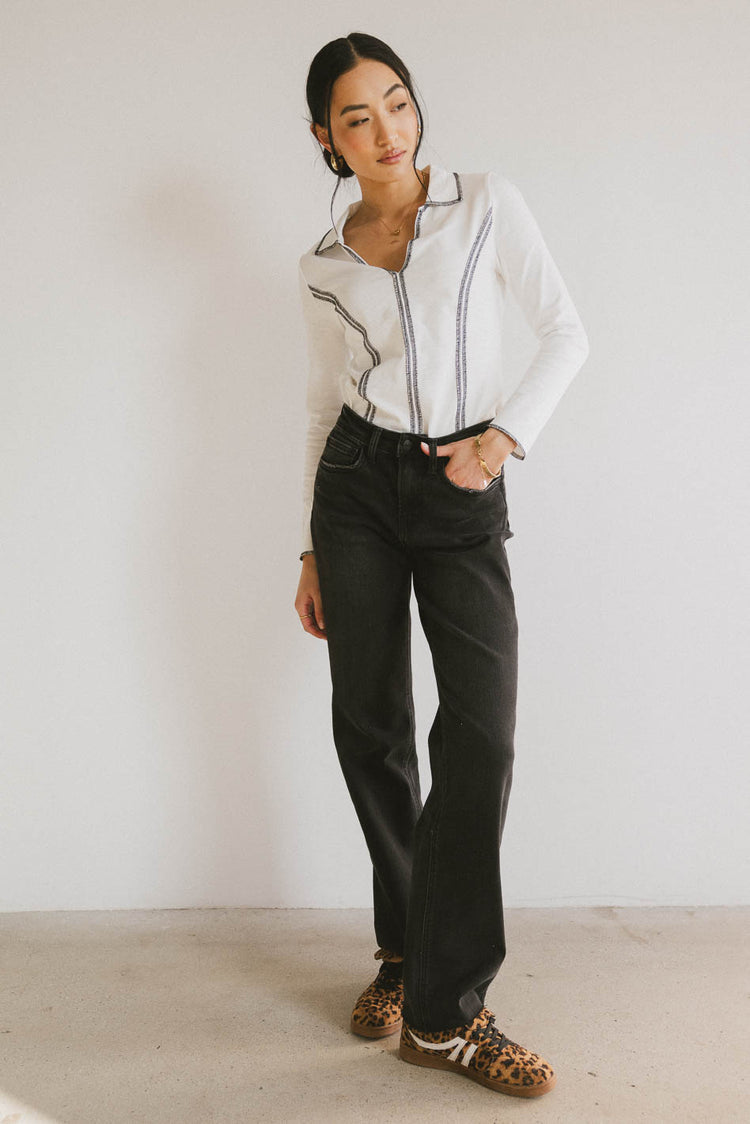 white contrast collared top with black denim