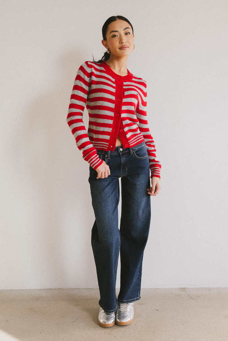 red striped cardigan with dark wash denim