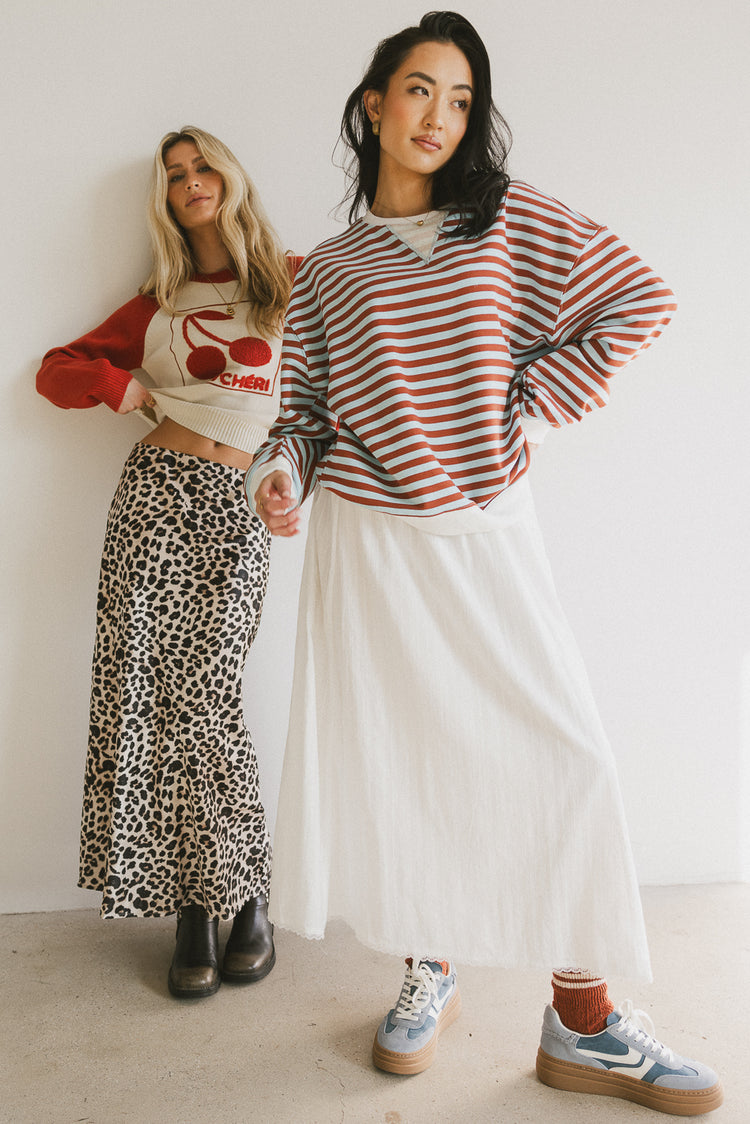 red and white cherry sweater