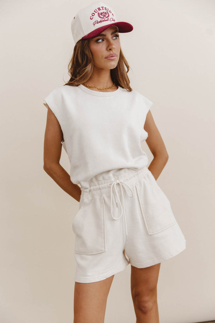 cream romper with pockets