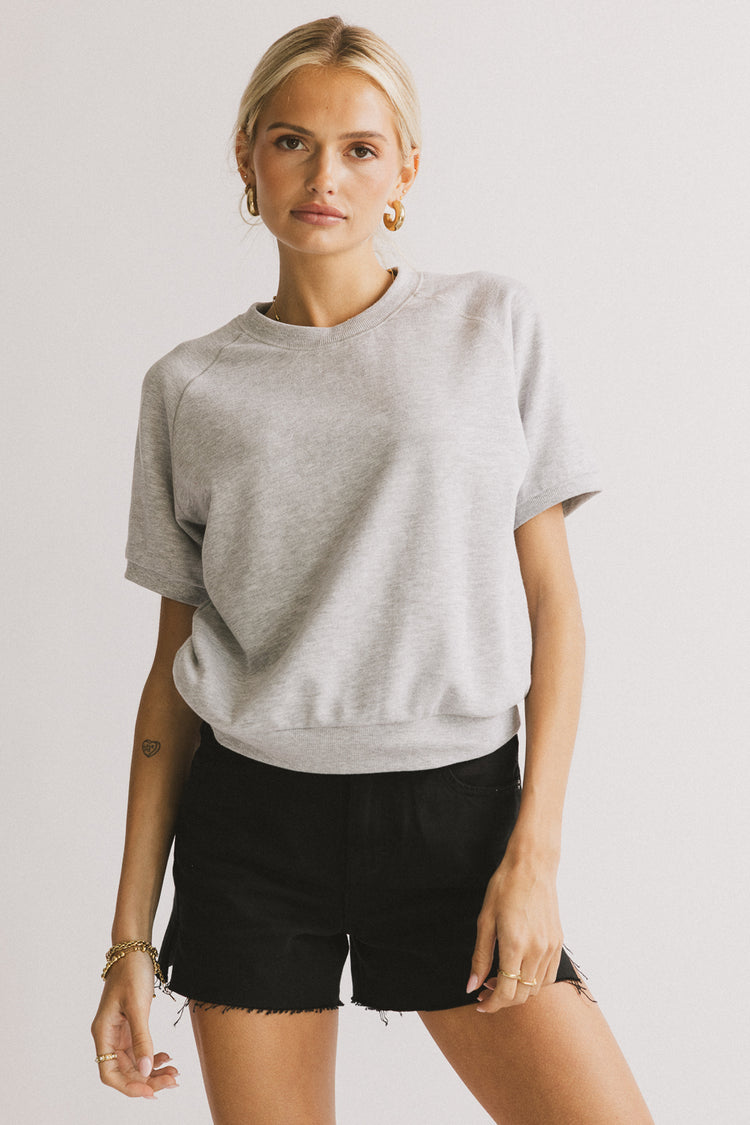 round neckline on grey shirt