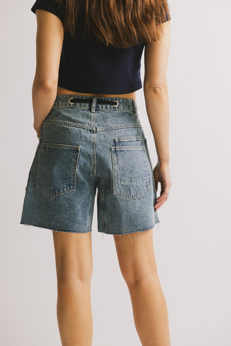 long medium wash denim shorts