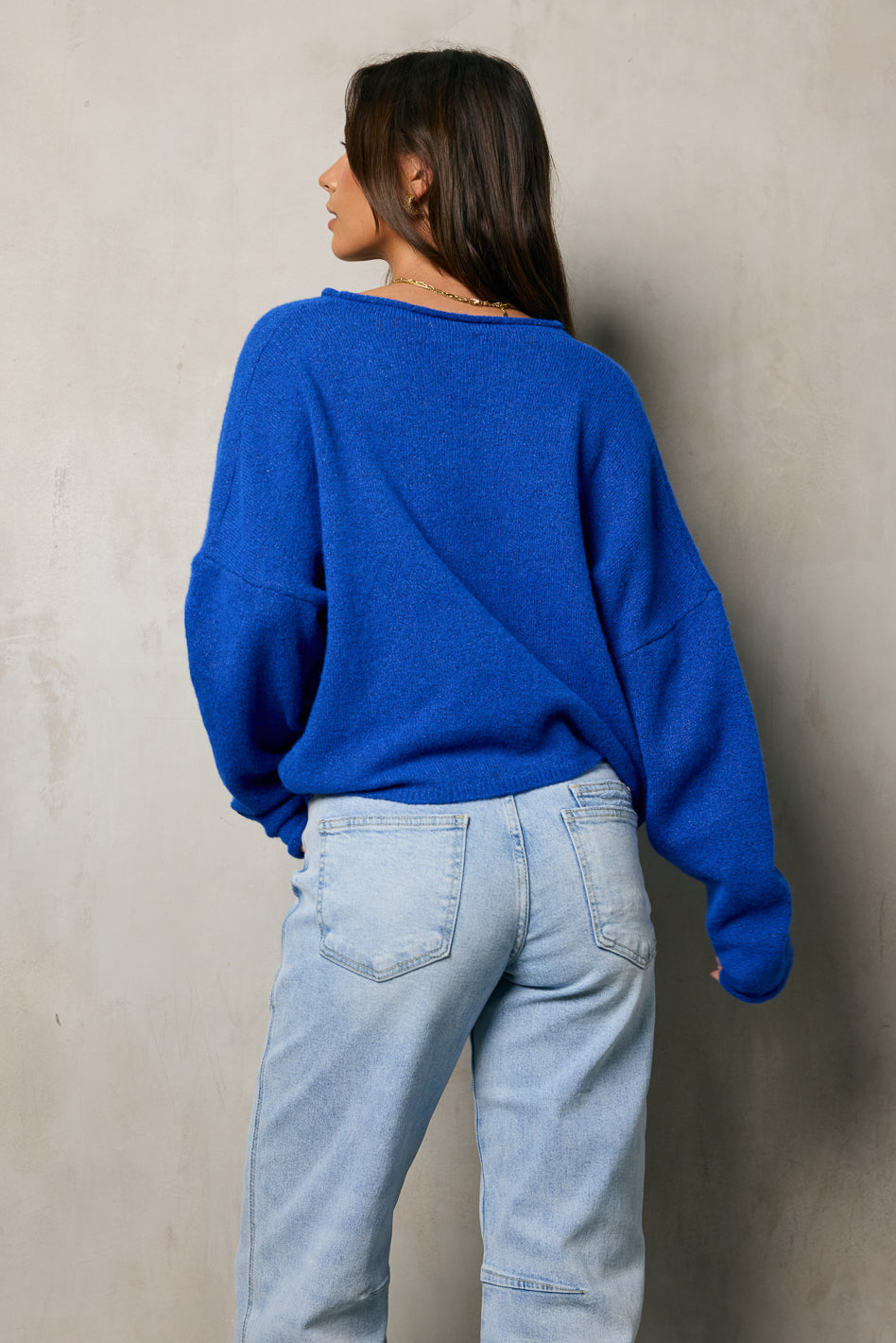 back side of blue cardigan 