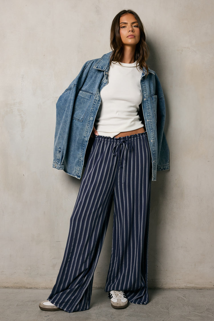 navy pants with stripes