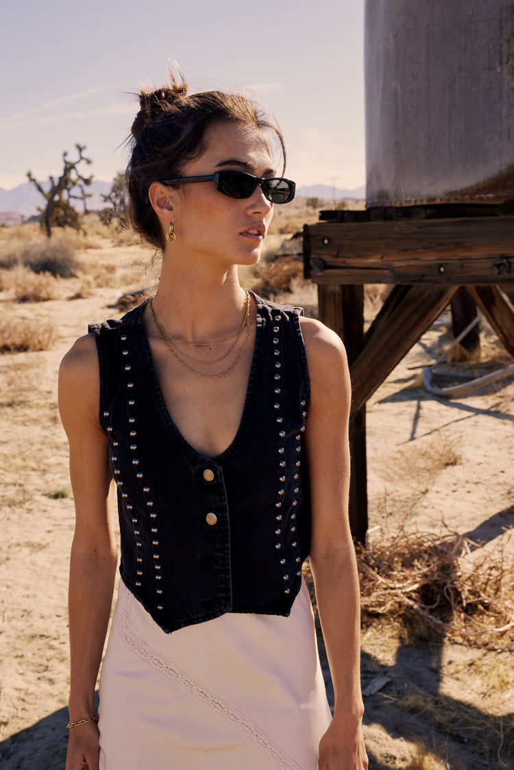 studded black vest