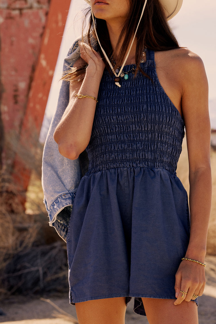 smocked romper in blue