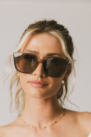 oversized grey sunglasses