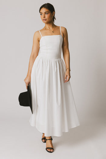 white dress with square neckline