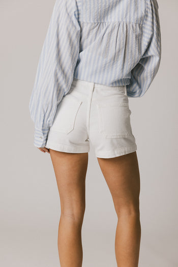 BACK POCKETS ON WHITE DENIM SHORTS