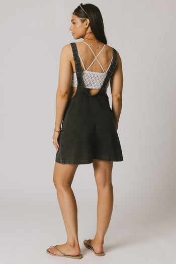 Adjustable Shoulder Straps on  black overalls 
