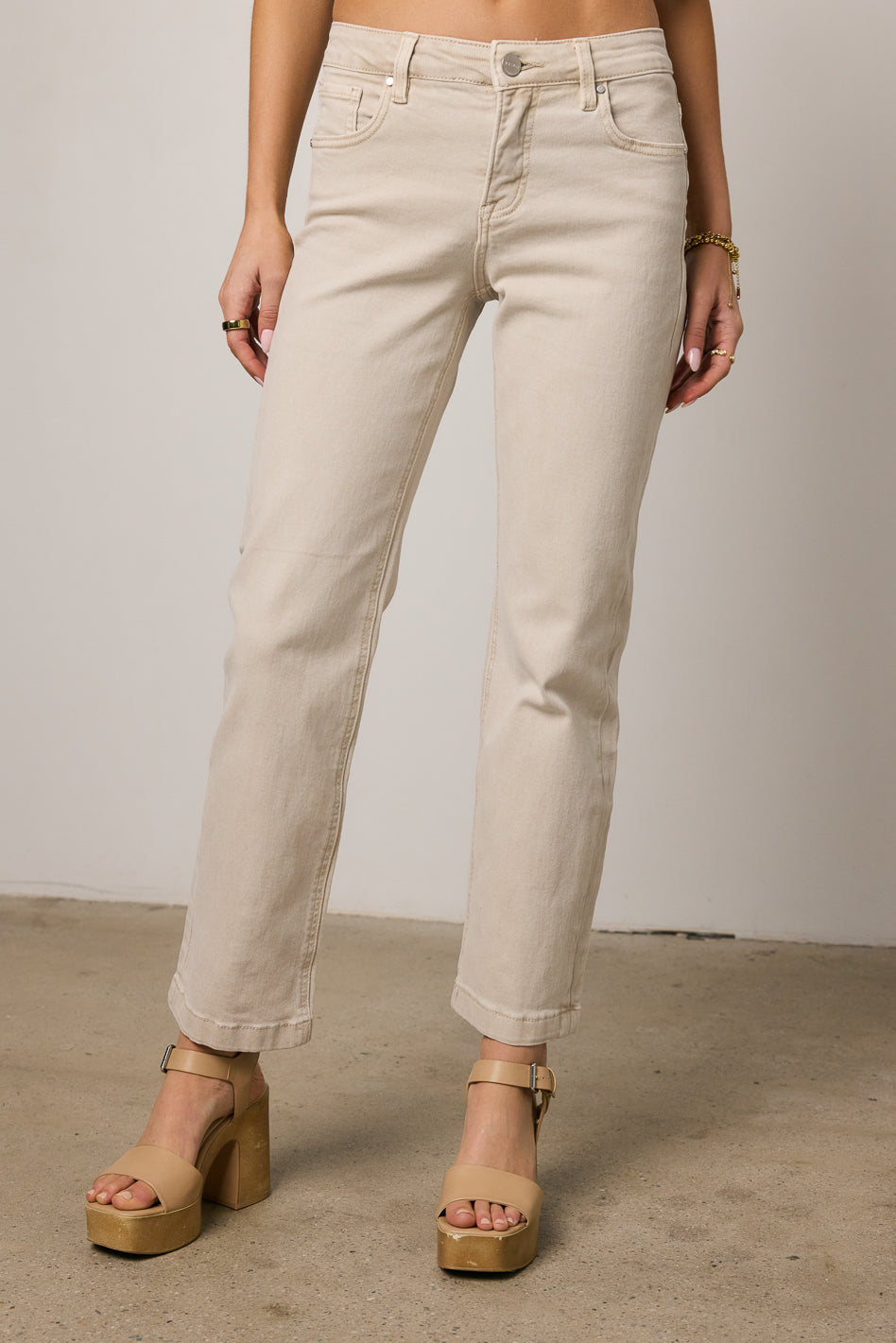 beige straight leg jeans