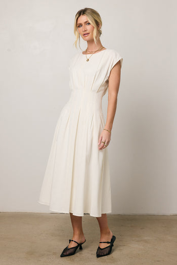 pleated white dress